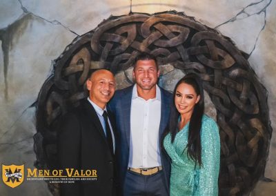 Eva with Tim Tebow in support for Men of Valor.